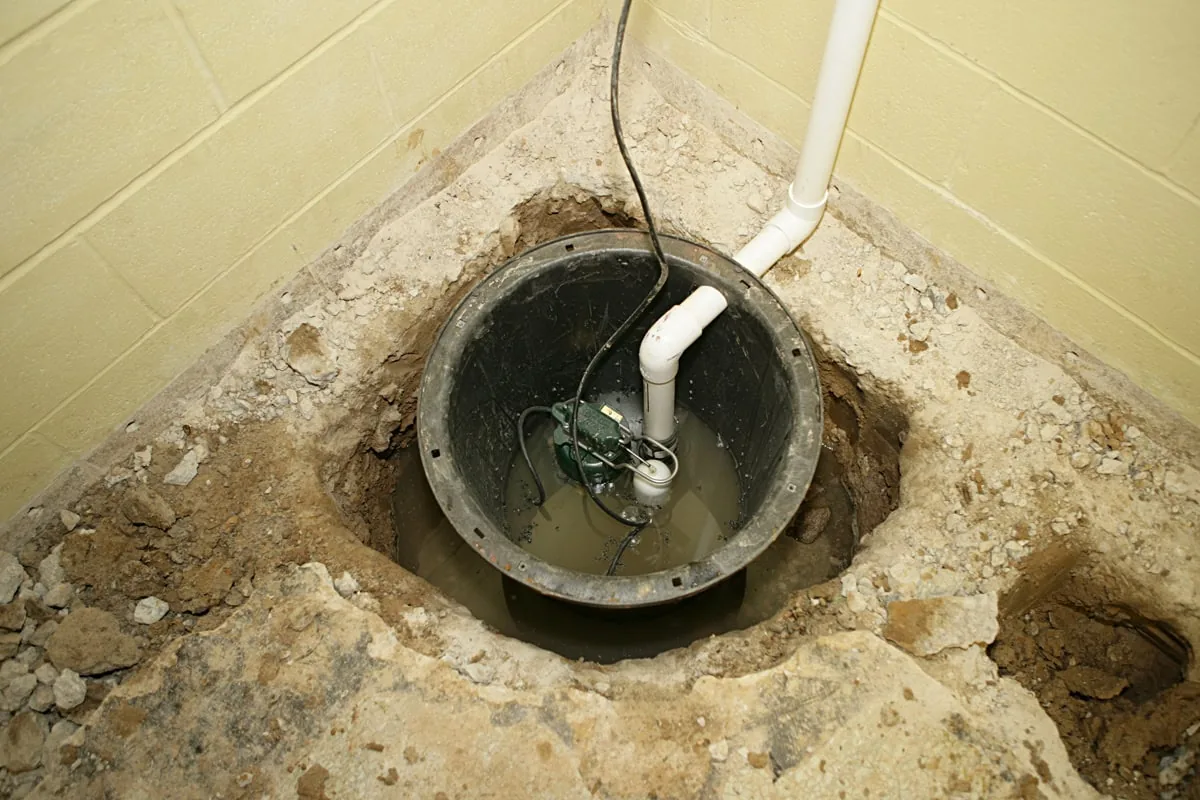Plumber servicing a water pump system to restore steady household water pressure.