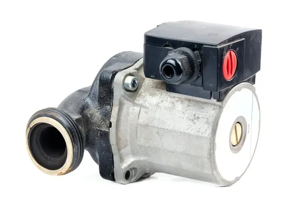 Recirculating pump with black motor housing and red valve button on white background