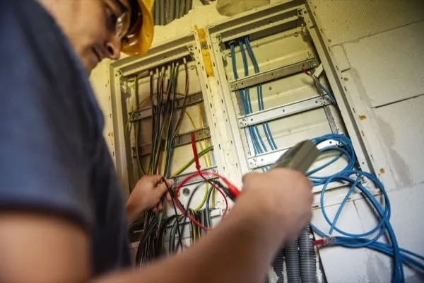 Electrician Testing Voltage.