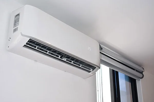 Mini split air conditioning system installed on the wall.