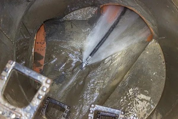 Hydro jetting sewer cleaning method.
