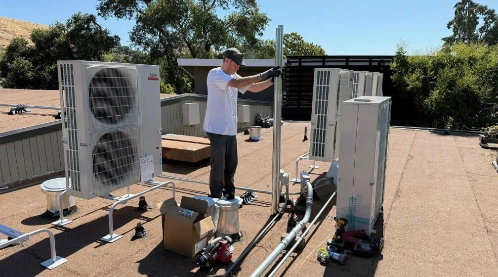 Ongaro & Sons technicians installing a multi-zone ductless system