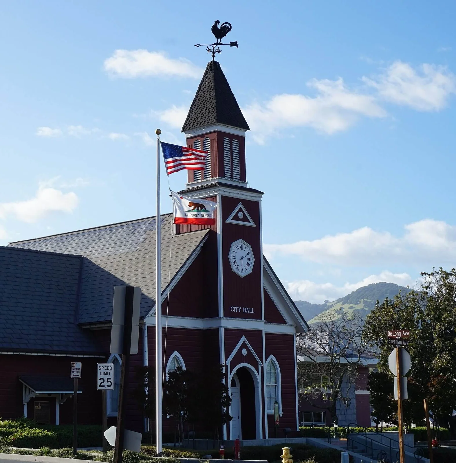 Novato City Hall, the historic red building with a clock tower in downtown Novato