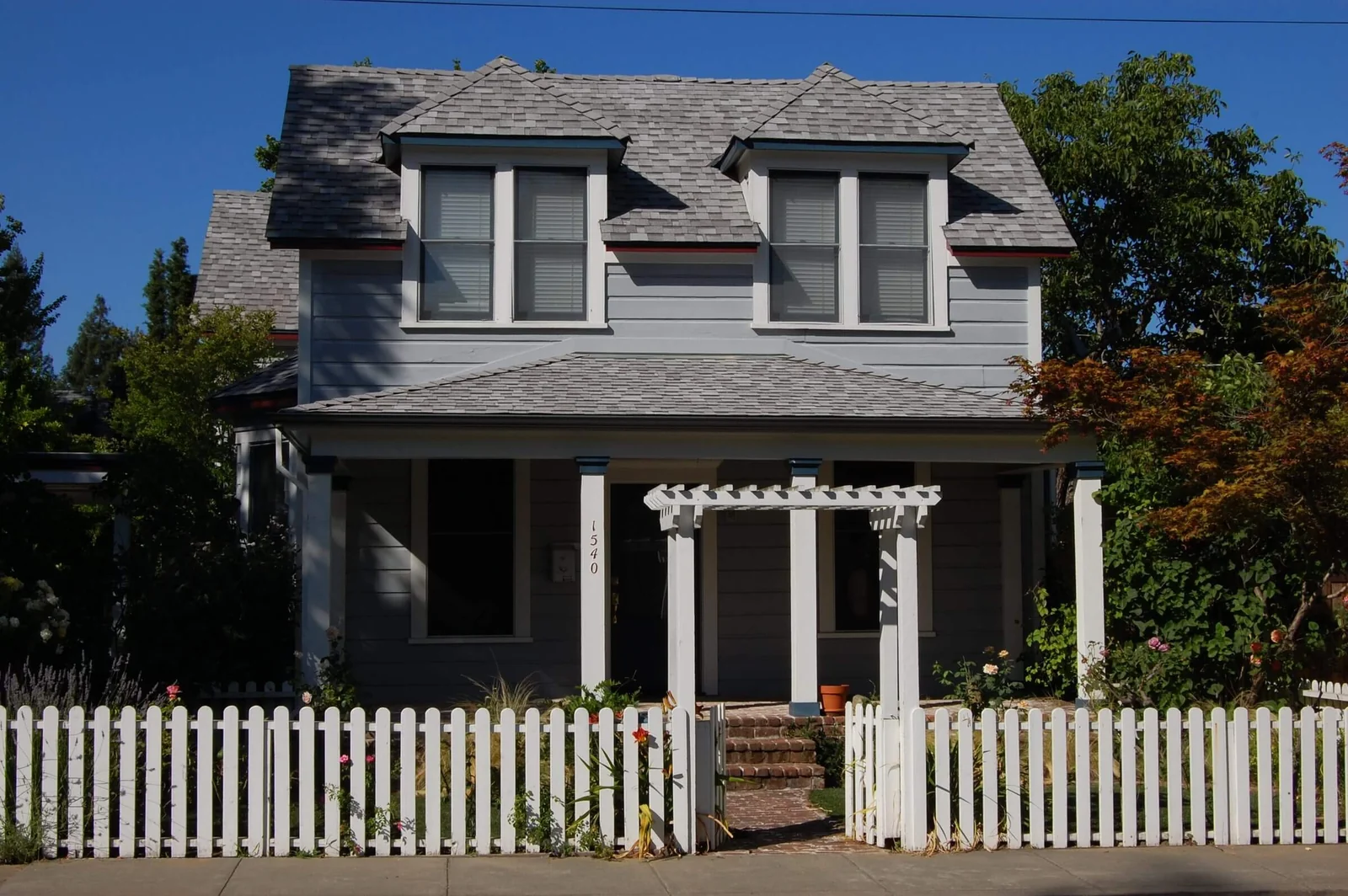 A Victorian house behind a picket fence in St. Helena