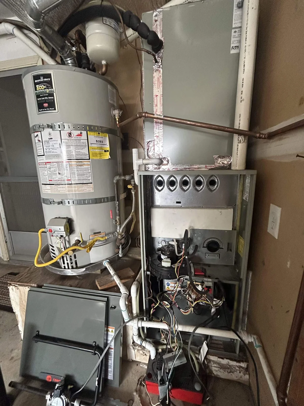 Heating and hot water equipment sharing a utility closet