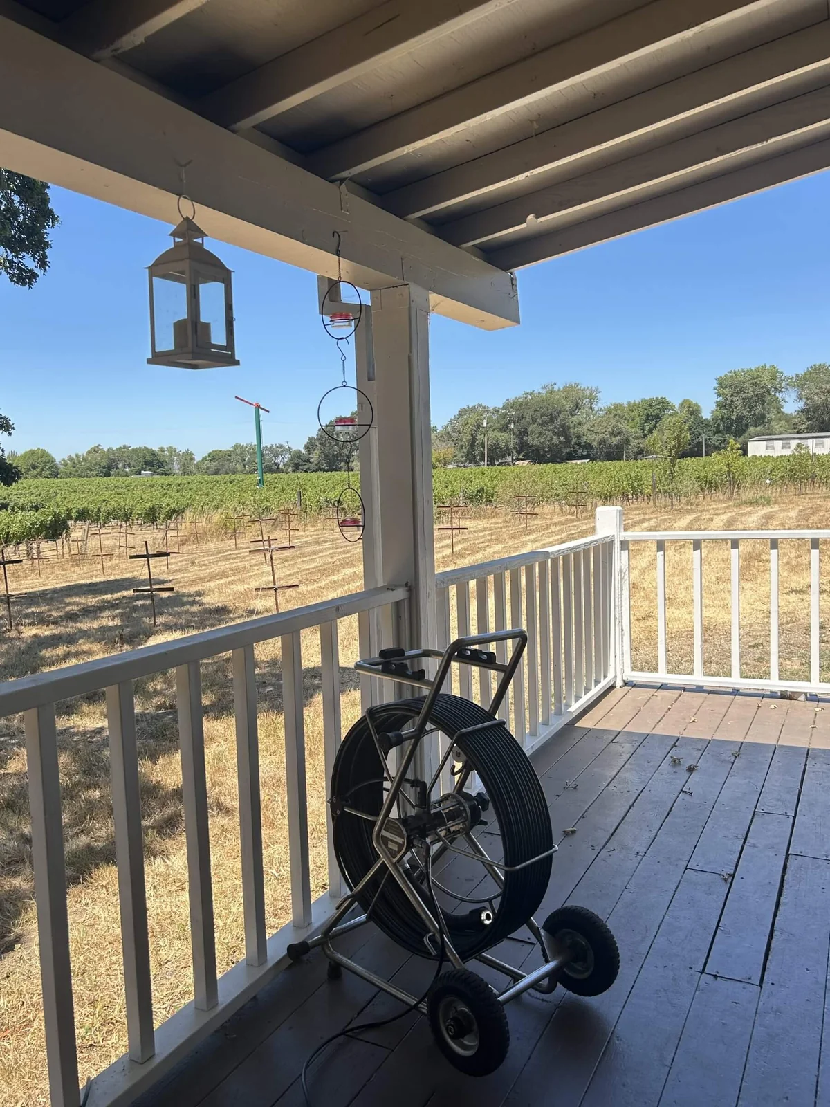 A sewer inspection camera reel at a rural property