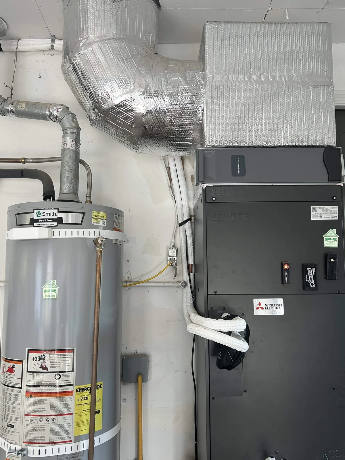A Mitsubishi air handler installed in a mechanical room