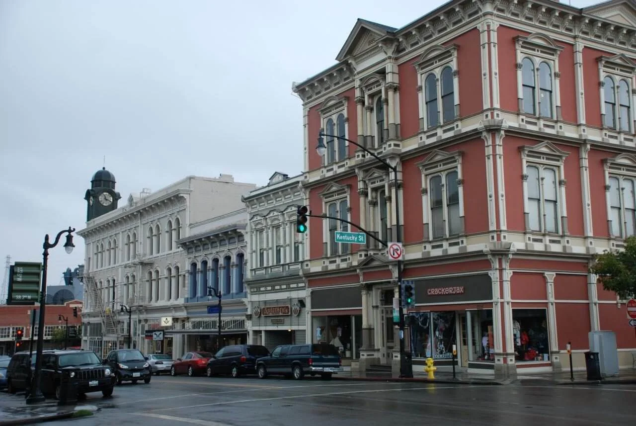 Historic Victorian-era commercial buildings along a downtown Petaluma street