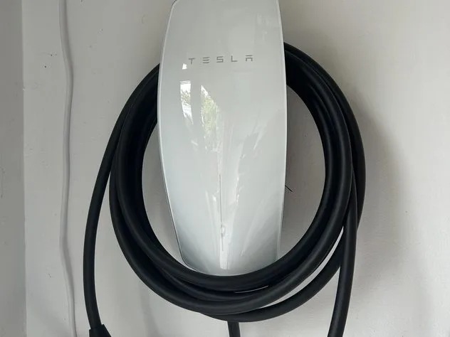 Wall-mounted EV charger installed at a North Bay home
