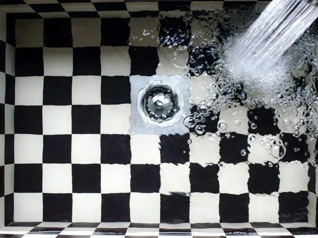 Water running down a sink drain
