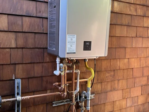Copper manifold on a tankless installation with recirculation